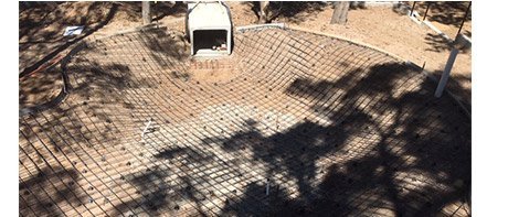 The crocodile pool under construction, reinforcement and precast culvert set out before the acrylic